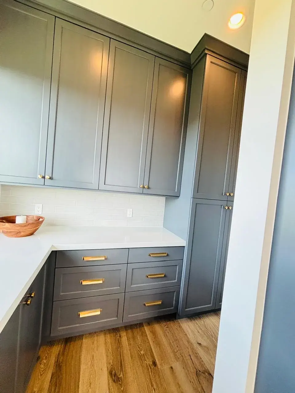 Freshly cleaned kitchen cabinetry and countertops